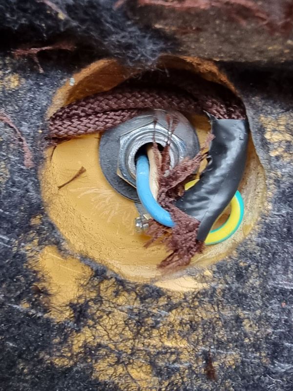 Worn, frayed flex and taped wiring found in the base of a lamp